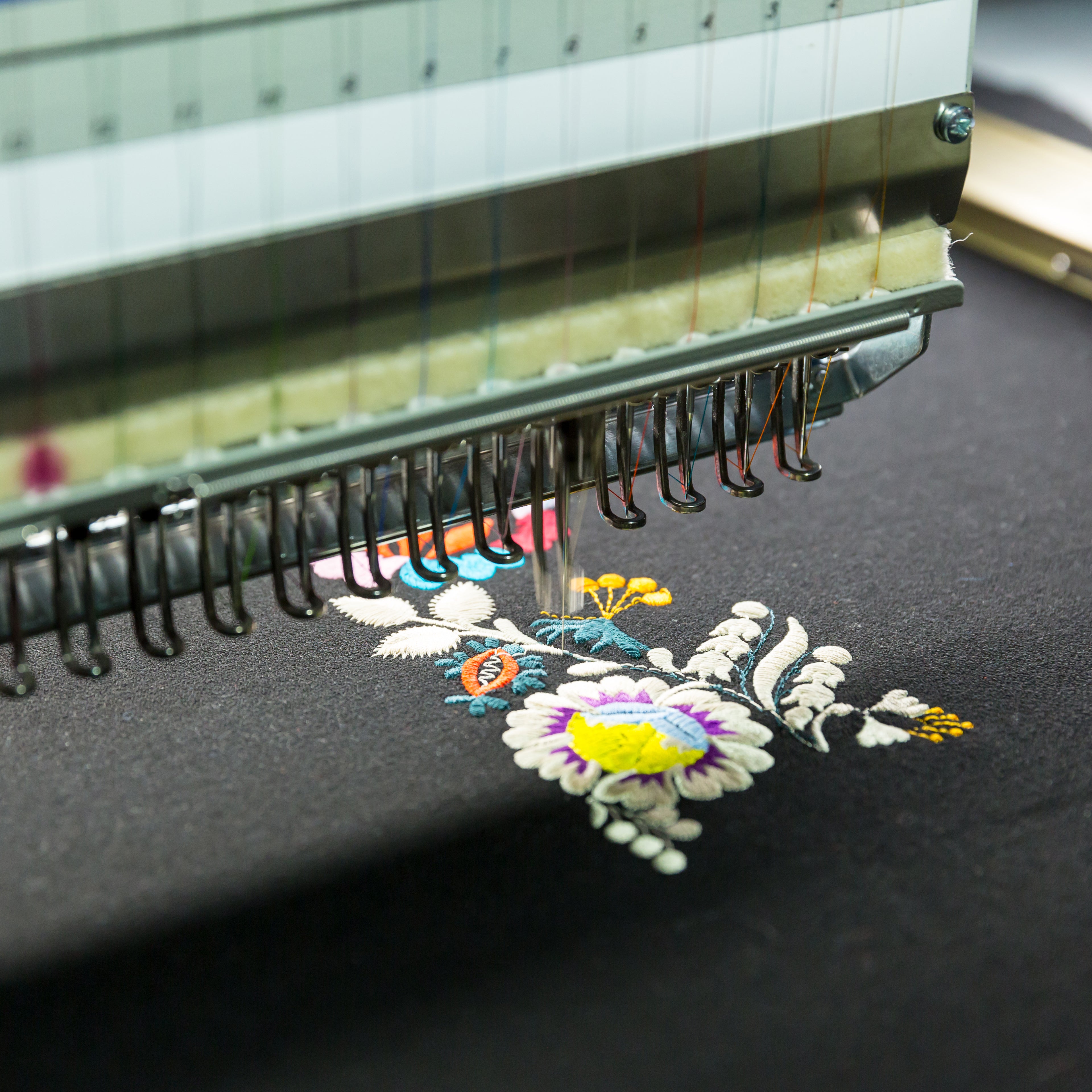 sewing-machine-in-work-textile-fabric-nobody-2021-08-26-16-25-53-utc - Tag&Crew